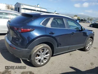 2023 Mazda CX-30 S Carbon Edition with VIN 3MVDMBCM1PM582423, listed as a Copart auction lot 47998275 with 35,412 mi miles and Salvage title. Bid and sale history available at DreamBid. Image 3.