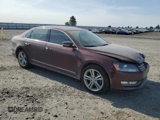2014 Volkswagen Passat SE with VIN 1VWBN7A32EC088774, listed as a Copart auction lot 60753755 with 124,660 mi miles and Salvage title. Bid and sale history available at DreamBid. Image 4.