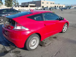 2011 Honda CR-Z with VIN JHMZF1D46BS010367, listed as a IAAI auction lot 41136945 with 125,437 mi miles. Bid and sale history available at carsss.com. Image 4.