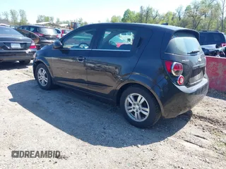 2014 Chevrolet Sonic LT with VIN 1G1JC6SB6E4210561, listed as a IAAI auction lot 42073197 with 100,945 mi miles. Bid and sale history available at carsss.com. Image 3.