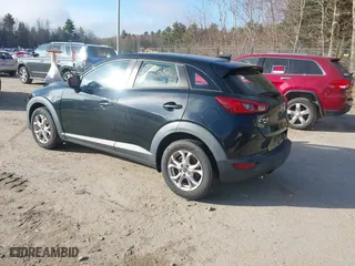 2016 Mazda CX-3 Sport with VIN JM1DKBB75G0124907, listed as a IAAI auction lot 42107232 with 128,411 mi miles. Bid and sale history available at carsss.com. Image 3.