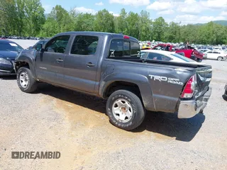 2014 Toyota Tacoma with VIN 5TFLU4ENXEX103129, listed as a IAAI auction lot 42230976 with 191,982 mi miles and . Bid and sale history available at DreamBid. Image 3.