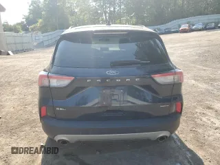 2021 Ford Escape SEL Hybrid z VIN 1FMCU9CZ7MUA94260, wystawiony jako Copart lot #71013514 z przebiegiem Nie podano mil oraz Szkoda całkowita • Salvage title. Historia ofert i sprzedaży dostępna na DreamBid. Obrazek 6.