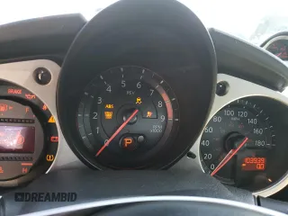 2013 Nissan 370Z with VIN JN1AZ4EH4DM384057, listed as a Copart auction lot 73185154 with 103,939 mi miles and Clean Title. Bid and sale history available at carsss.com. Image 9.