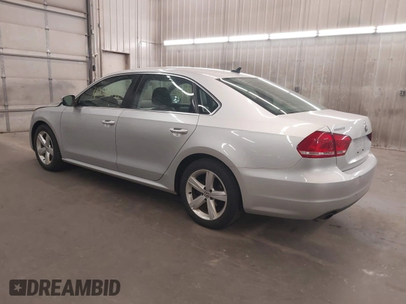 2013 Volkswagen Passat SE with VIN 1VWBH7A39DC145297, listed as a IAAI auction lot 42048991 with 146,897 mi miles and . Bid and sale history available at DreamBid. Image 3.