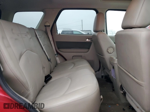 2009 Mercury Mariner Premier z VIN 4M2CU877X9KJ04073, wystawiony jako Copart lot #85888814 z przebiegiem 88 106 mil mil oraz Szkoda całkowita • Salvage title. Historia ofert i sprzedaży dostępna na DreamBid. Obrazek 11.