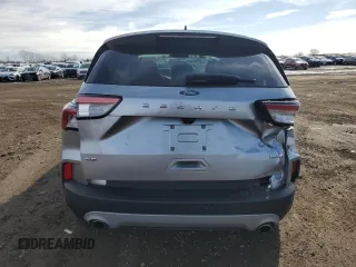 2021 Ford Escape SE with VIN 1FMCU9G61MUA46110, listed as a Copart auction lot 46952005 with 55,979 mi miles and Salvage title. Bid and sale history available at DreamBid. Image 6.