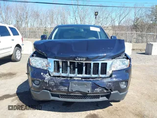 2011 Jeep Grand Cherokee Laredo with VIN 1J4RR4GG3BC670712, listed as a IAAI auction lot 41738127 with 93,714 mi miles and . Bid and sale history available at DreamBid. Image 6.