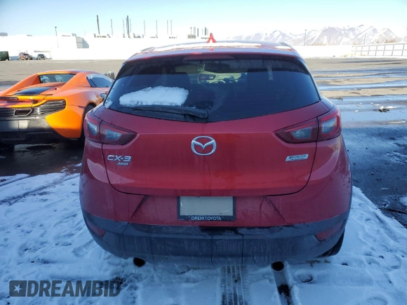 2016 Mazda CX-3 Grand Touring with VIN JM1DKBD78G0113185, listed as a Copart auction lot 42802145 with 158,068 mi miles and Salvage Title. Bid and sale history available at DreamBid. Image 6.