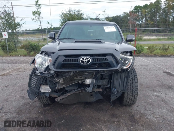 2014 Toyota Tacoma with VIN 5TFLU4EN9EX099414, listed as a IAAI auction lot 40528514 with 122,827 mi miles. Bid and sale history available at carsss.com. Image 11.
