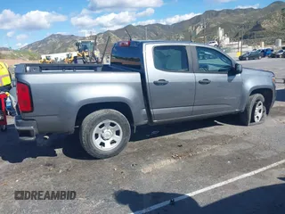 2021 Chevrolet Colorado 2WD Work Truck z VIN 1GCGSBEA5M1130412, wystawiony jako IAAI lot #41935021 z przebiegiem 56 475 mil mil oraz . Historia ofert i sprzedaży dostępna na DreamBid. Obrazek 13.