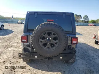 2022 Jeep Wrangler Unlimited Willys with VIN 1C4HJXDG1NW102069, listed as a Copart auction lot 52353995 with 33,328 mi miles and Salvage Title. Bid and sale history available at DreamBid. Image 6.