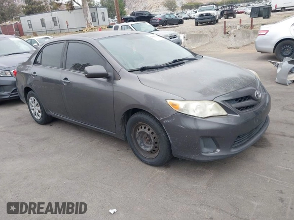 2011 Toyota Corolla L with VIN JTDBU4EE7BJ106810, listed as a IAAI auction lot 42054750 with 256,064 mi miles. Bid and sale history available at carsss.com. Image 1.