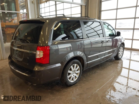 2016 Chrysler Town & Country Touring with VIN 2C4RC1BG9GR222339, listed as a IAAI auction lot 41580617 with 80,795 mi miles and . Bid and sale history available at carsss.com. Image 4.