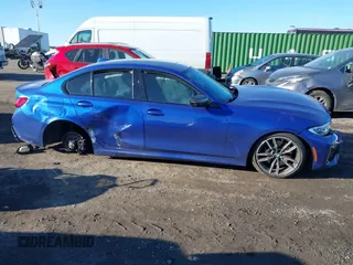 2020 BMW 3 Series M340i xDrive with VIN WBA5U9C05LFJ68807, listed as a IAAI auction lot 41641820 with 48,763 mi miles and . Bid and sale history available at DreamBid. Image 13.