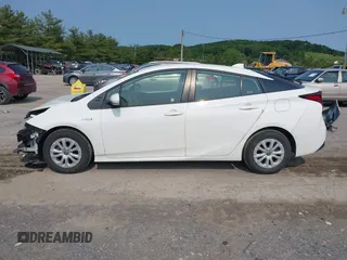 2021 Toyota Prius L Eco with VIN JTDKAMFU7M3147668, listed as a IAAI auction lot 42390394 with 80,831 mi miles and . Bid and sale history available at DreamBid. Image 15.