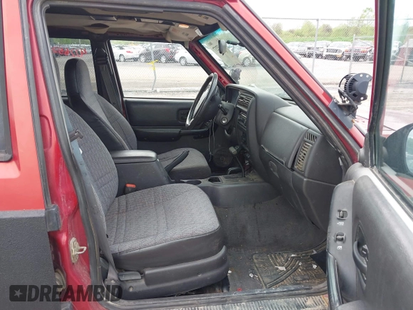1999 Jeep Cherokee Sport with VIN 1J4FF68SXXL670160, listed as a IAAI auction lot 42265237 with 197,390 mi miles and . Bid and sale history available at DreamBid. Image 5.