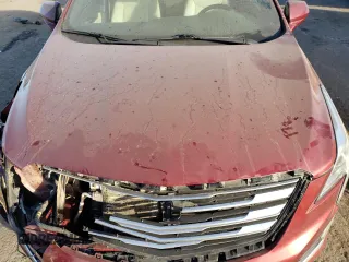 2018 Cadillac XT5 FWD with VIN 1GYKNARS2JZ241702, listed as a Copart auction lot 84031294 with 67,866 mi miles and Salvage title. Bid and sale history available at DreamBid. Image 12.