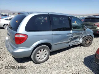 2006 Chrysler Town & Country with VIN 1A4GP45R96B519368, listed as a Copart auction lot 70233954 with 163,184 mi miles and Salvage Title. Bid and sale history available at DreamBid. Image 3.