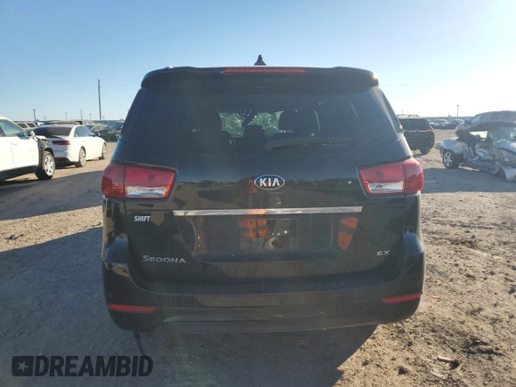 2018 Kia Sedona EX with VIN KNDMC5C12J6373128, listed as a Copart auction lot 83603524 with 64,711 mi miles and Salvage Title. Bid and sale history available at carsss.com. Image 6.