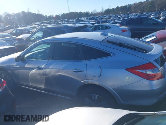 2014 Honda Crosstour EX-L z VIN 5J6TF2H5XEL003186, wystawiony jako IAAI lot #41804813 z przebiegiem 119 982 mil mil oraz . Historia ofert i sprzedaży dostępna na DreamBid. Obrazek 14.