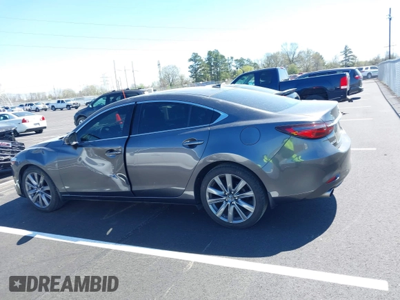 2020 Mazda 6 Grand Touring with VIN JM1GL1TY0L1522025, listed as a IAAI auction lot 41876429 with 68,101 mi miles and . Bid and sale history available at DreamBid. Image 14.