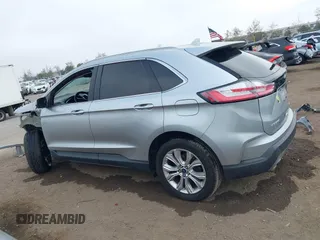 2020 Ford Edge Titanium z VIN 2FMPK4K95LBA16379, wystawiony jako IAAI lot #41190704 z przebiegiem 69 076 mil mil oraz . Historia ofert i sprzedaży dostępna na DreamBid. Obrazek 15.