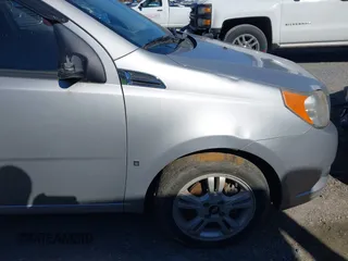 2009 Chevrolet Aveo 1LT with VIN KL1TD66E39B670755, listed as a IAAI auction lot 41617362 with 179,075 mi miles and . Bid and sale history available at DreamBid. Image 12.