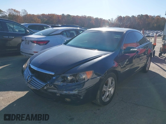 2005 Acura RL z VIN JH4KB16525C019908, wystawiony jako IAAI lot #41106944 z przebiegiem 203 359 mil mil oraz . Historia ofert i sprzedaży dostępna na DreamBid. Obrazek 2.