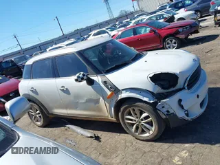 2014 MINI Countryman with VIN WMWZB3C52EWR42241, listed as a IAAI auction lot 41734963 with 121,325 mi miles and . Bid and sale history available at DreamBid. Image 13.