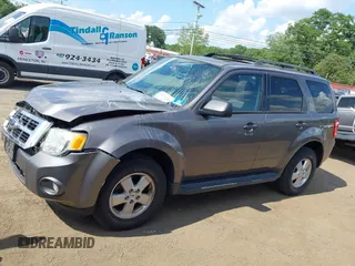 2012 Ford Escape XLT with VIN 1FMCU9D75CKC22907, listed as a IAAI auction lot 42571195 with 198,537 mi miles and . Bid and sale history available at DreamBid. Image 14.