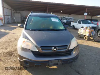 2009 Honda CR-V LX with VIN 5J6RE48389L011915, listed as a IAAI auction lot 41301796 with 214,807 mi miles. Bid and sale history available at carsss.com. Image 13.
