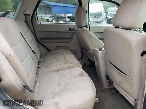 2012 Ford Escape XLT с VIN 1FMCU9DGXCKB34077, выставлен на аукционе Copart как лот 71502944 с пробегом 297 902 миль миль и Списание • Salvage title. История ставок и продаж доступна на DreamBid. Изображение 11.