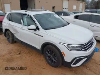 2022 Volkswagen Tiguan SE with VIN 3VV3B7AX7NM035703, listed as a IAAI auction lot 41692101 with 53,979 mi miles and . Bid and sale history available at DreamBid. Image 1.