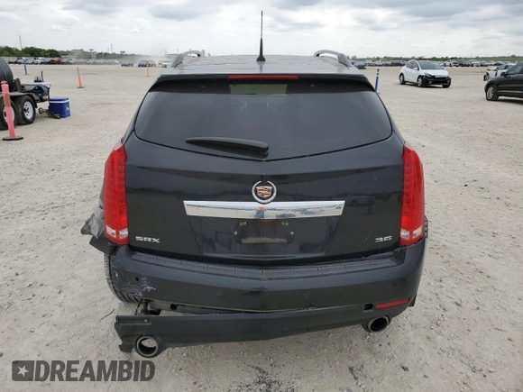 2013 Cadillac SRX Premium Collection z VIN 3GYFNEE33DS537255, wystawiony jako Copart lot #53151175 z przebiegiem 98 135 mil mil oraz Czysty tytuł • Clean title. Historia ofert i sprzedaży dostępna na DreamBid. Obrazek 6.