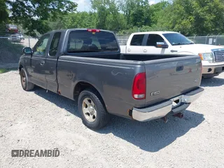 2002 Ford F-150 XL with VIN 1FTRX17W22NA43571, listed as a IAAI auction lot 42697861 with Not provided miles and . Bid and sale history available at DreamBid. Image 3.
