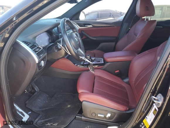 2022 BMW X4 M40i with VIN 5UX43DT03N9K45498, listed as a Copart auction lot 40460044 with 59,563 mi miles. Bid and sale history available at carsss.com. Image 7.