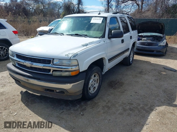 2005 Chevrolet Tahoe LS with VIN 1GNEK13T65J198121, listed as a IAAI auction lot 41826459 with 233,718 mi miles and . Bid and sale history available at DreamBid. Image 2.