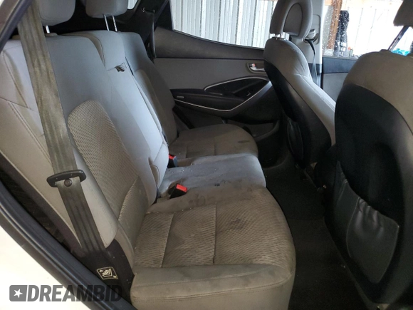 2016 Hyundai Santa Fe z VIN 5XYZTDLB8GG353853, wystawiony jako Copart lot #51740105 z przebiegiem 147 007 mil mil oraz Szkoda całkowita • Salvage title. Historia ofert i sprzedaży dostępna na DreamBid. Obrazek 11.