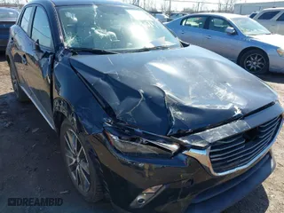2016 Mazda CX-3 Grand Touring with VIN JM1DKBD71G0126795, listed as a IAAI auction lot 41807353 with 44,997 mi miles. Bid and sale history available at carsss.com. Image 6.