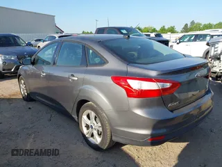 2013 Ford Focus SE with VIN 1FADP3F20DL325958, listed as a IAAI auction lot 41997500 with 195,793 mi miles. Bid and sale history available at carsss.com. Image 3.