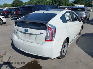 2014 Toyota Prius Four z VIN JTDKN3DU9E1755013, wystawiony jako IAAI lot #42228158 z przebiegiem 136 391 mil mil oraz . Historia ofert i sprzedaży dostępna na DreamBid. Obrazek 4.