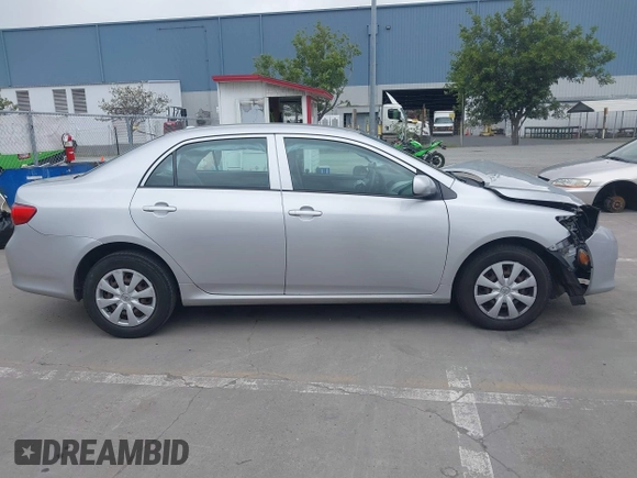 2009 Toyota Corolla with VIN 1NXBU40E29Z162410, listed as a IAAI auction lot 41905756 with 104,866 mi miles. Bid and sale history available at carsss.com. Image 12.
