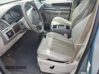 2009 Chrysler Town & Country Touring with VIN 2A8HR54X39R667914, listed as a Copart auction lot 66010904 with 214,583 mi miles and Salvage Title. Bid and sale history available at DreamBid. Image 7.
