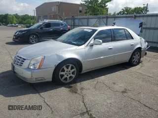 2009 Cadillac DTS 1SA z VIN 1G6KD57Y19U136085, wystawiony jako Copart lot #56983425 z przebiegiem 115 468 mil mil oraz Czysty tytuł • Clean title. Historia ofert i sprzedaży dostępna na DreamBid. Obrazek 1.