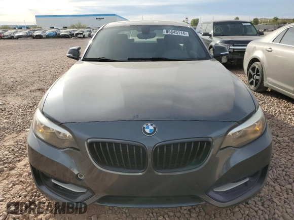 2015 BMW 2 Series 228i with VIN WBA1F5C57FV257639, listed as a Copart auction lot 86645114 with 73,094 mi miles and Salvage Title. Bid and sale history available at carsss.com. Image 5.