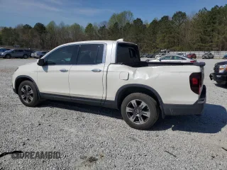 2019 Honda Ridgeline RTL-E with VIN 5FPYK3F72KB021673, listed as a Copart auction lot 50599005 with 65,469 mi miles and Salvage title. Bid and sale history available at DreamBid. Image 2.
