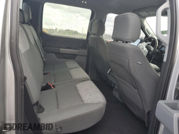 2023 Ford F-150 XL with VIN 1FTEW1C50PKF91124, listed as a Copart auction lot 51538865 with 22,128 mi miles and Salvage title. Bid and sale history available at DreamBid. Image 10.