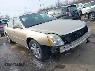 2006 Cadillac DTS 1SB z VIN 1G6KD57Y46U101830, wystawiony jako IAAI lot #41570907 z przebiegiem 158 691 mil mil oraz . Historia ofert i sprzedaży dostępna na DreamBid. Obrazek 1.