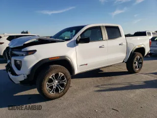 2023 GMC Canyon 4WD AT4 with VIN 1GTP6DEK6P1237045, listed as a Copart auction lot 74981784 with 18,036 mi miles and Salvage Title. Bid and sale history available at carsss.com. Image 1.